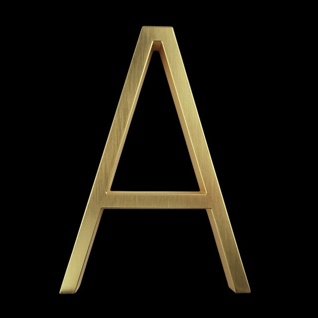 Moderne Hausnummern in Gold