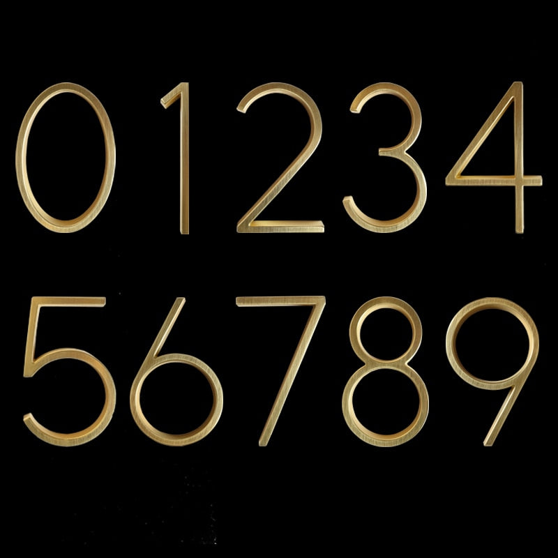 Moderne Hausnummern in Gold
